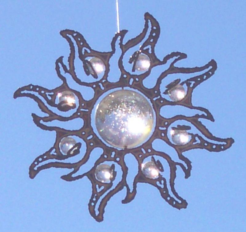 sun burst with center spinning glass marble & spiral mounted sattelite marbles