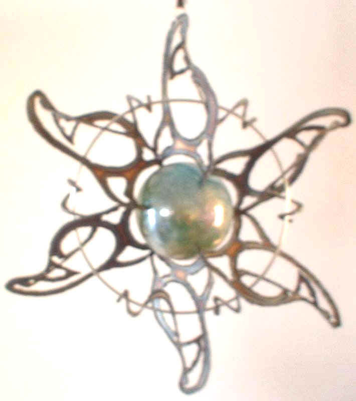 3D stainless steel sun burst with glass marble center & wire ring